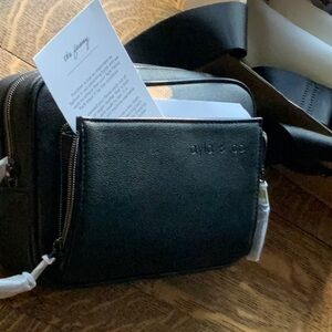 NEW Black vegan leather.   Special Price.